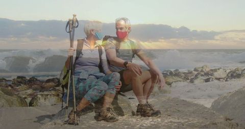 Senior Couple Enjoying Leisurely Hike by Waterfront