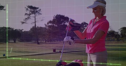 Woman Preparing Golf Gear on Luxurious Golf Course