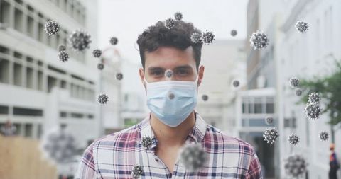 Man wearing face mask surrounded by virus particles illustration