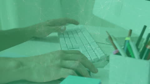 Hands Typing on Keyboard with Digital Connection Overlay