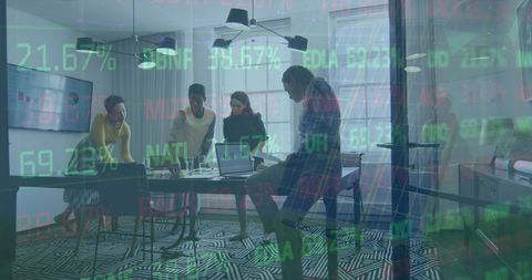 Diverse business team analyzing green energy financial data