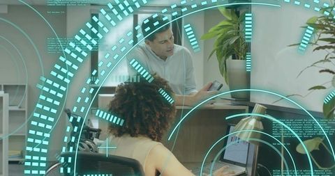 Male and Female Coworkers Collaborating in High-Tech Office Environment