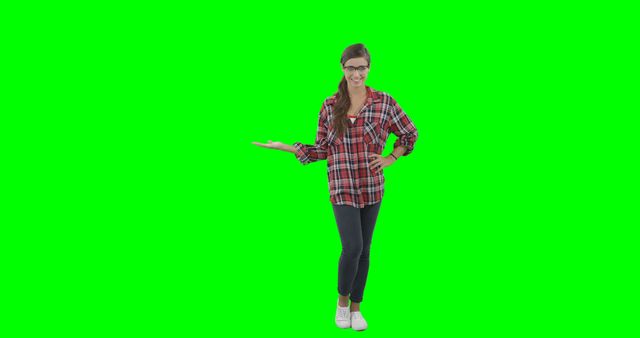 Smiling Woman in Casual Outfit Presenting against Green Screen - Download Free Stock Images Pikwizard.com