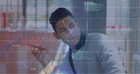Indian professional checking stock charts on smartphone through office glass with data overlays