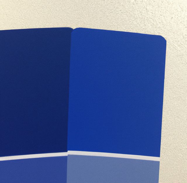 Close up of blue paint swatches on white backrgound. Paint swatch, design and colors concept.