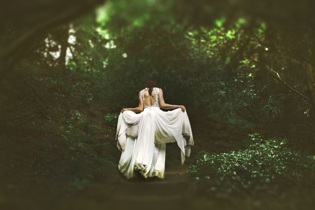 Bride in Elegant Dress Wandering Through Forest - Download Free Stock Photos Pikwizard.com