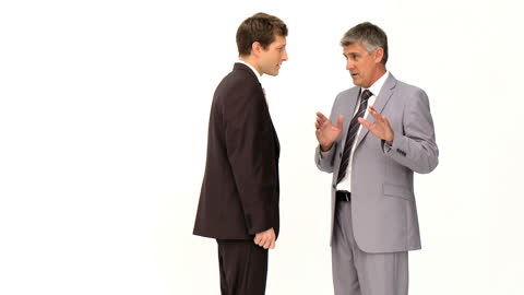 Businessman Explaining to Colleague in Professional Setting