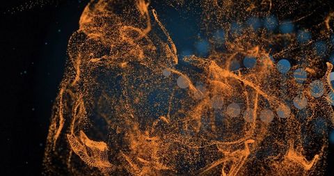 Swirling glowing orange particles forming mesh ribbons, trails and pale blue bokeh