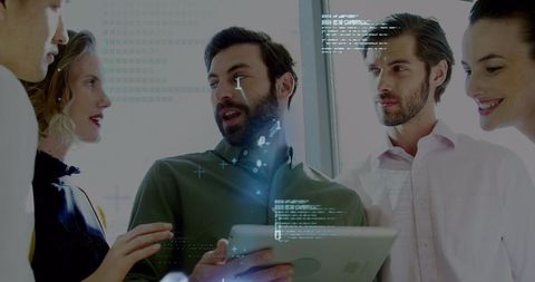 Collaborative Team Analyzing Data on Tablet