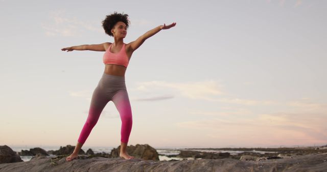 Young Woman Practicing Yoga on Beach at Sunset - Download Free Stock Images Pikwizard.com