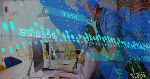 Coworkers Collaborating in Modern Office Overlaid with Data Graphics