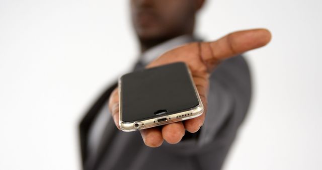 Close-up of businessman hand showing mobile phone on white background 4k - Download Free Stock Photos Pikwizard.com