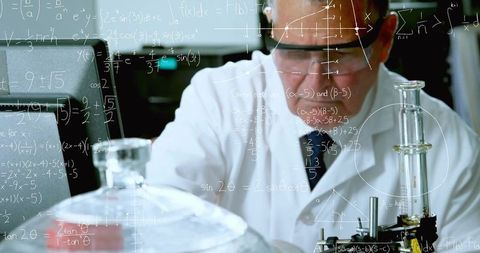 Lab scientist adjusting glassware wearing goggles and lab coat with equations overlay