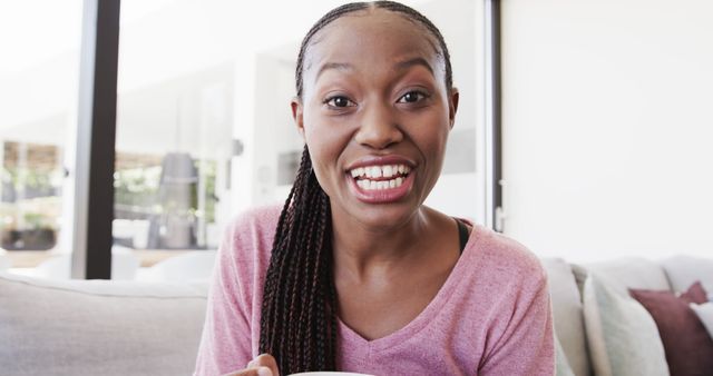 Joyful Young Woman Vlogging at Home While Enjoying Breakfast - Download Free Stock Images Pikwizard.com