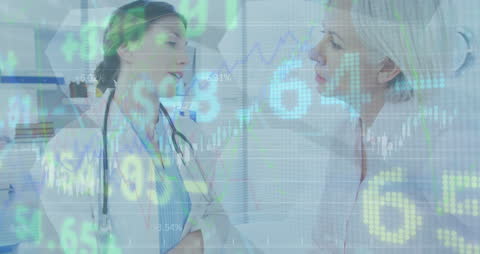 Female Doctors Discussing Medical Data Trends