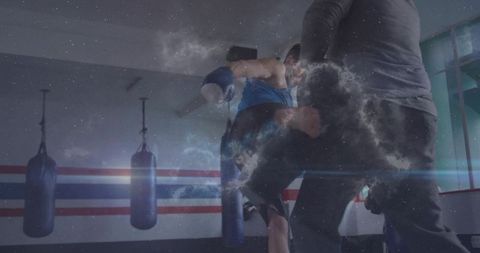 Intense knee strike sparring with cosmic overlay in boxing gym — trainer holding pads
