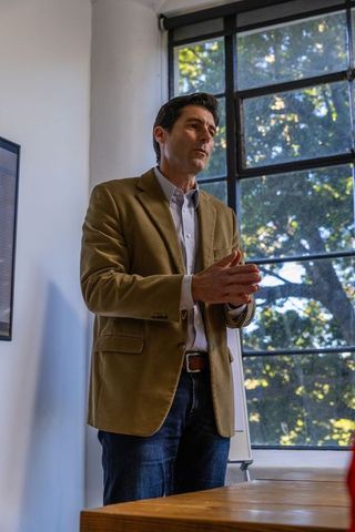 Businessman presenting in contemporary office environment