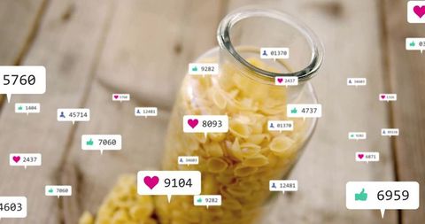 Shell pasta in jar with social media notification icons overlays