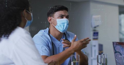 Medical Professionals Discussing Diagnosis in Modern Clinic