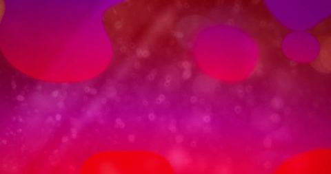 Vibrant blurred lights and shapes on red background