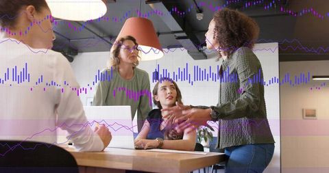 Leading woman presenting data to team in modern office with laptop and graph overlays