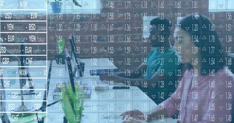 Professional Team Analyzing Financial Data in Modern Office