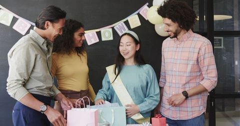 Colleagues Celebrating Baby Shower in Office Setting