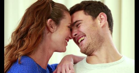 Young Couple Sharing Joyful Laughter and Intimate Moments - Download Free Stock Images Pikwizard.com