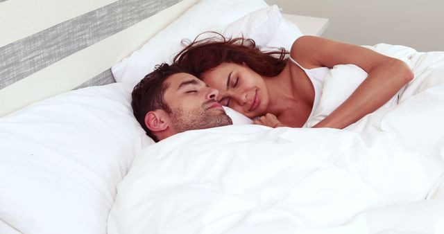 Happy couple sleeping together in bed - Download Free Stock Photos Pikwizard.com