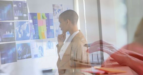 Businesswoman Analyzing Data with Digital Overlays