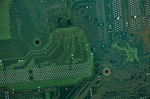 Intricate Green Circuit Board Close-Up for Technology Concepts