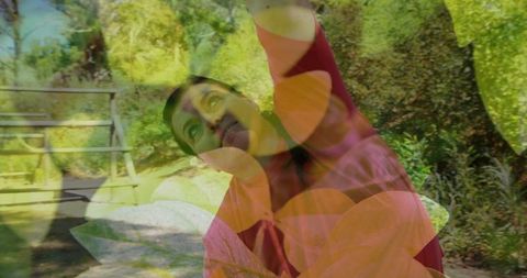 Outdoor relaxation: woman stretching in pink surrounded by nature