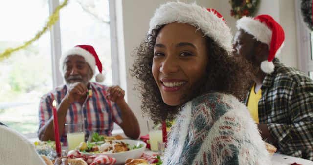 Family Enjoying Christmas Meal Together in Festive Home - Download Free Stock Images Pikwizard.com