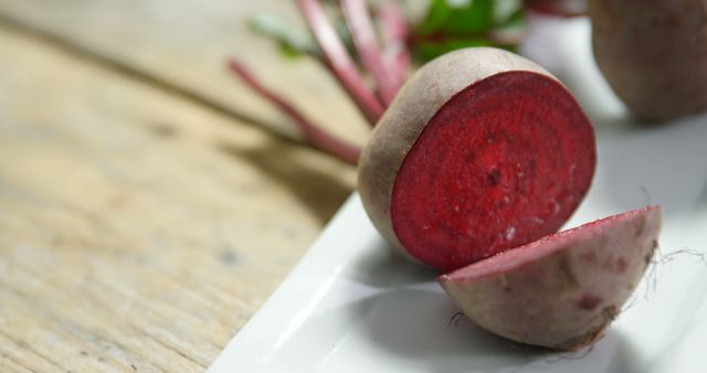 Fresh Sliced Beetroots on Wooden Table - Download Free Stock Images Pikwizard.com