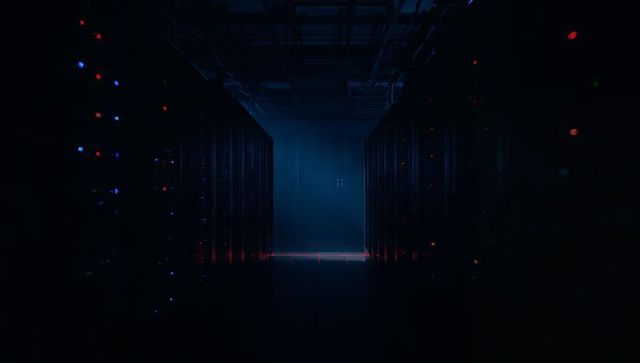 Futuristic data center corridor with glowing led lights