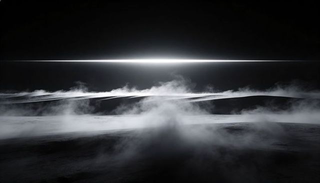 Backlit luminous band sculpting dune silhouettes through low-lying fog at pre-dawn halo