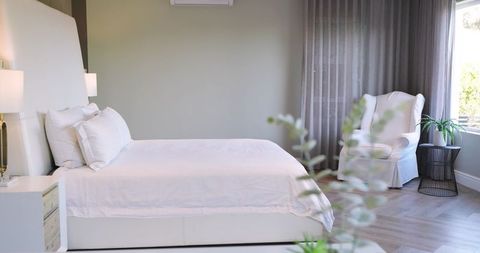 Modern Minimalist Bedroom Interior in Serene Gray and White