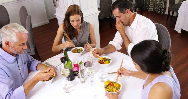 Group of Friends Eating Asian Cuisine at Restaurant - Download Free Stock Images Pikwizard.com