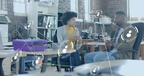 Diverse Colleagues Networking During Office Lunch