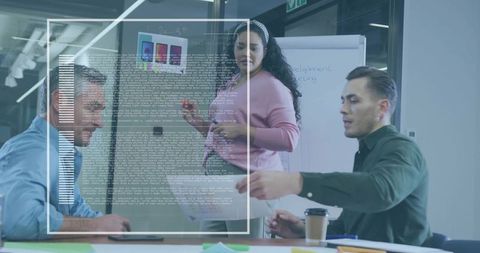 Team collaborating and presenting product strategy in glass conference room with ar overlay