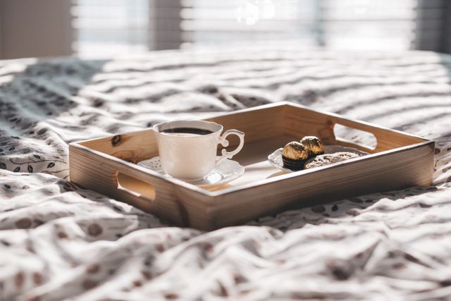 Cozy Morning Coffee Tray on Bed with Chocolates and Soft Light - Download Free Stock Photos Pikwizard.com