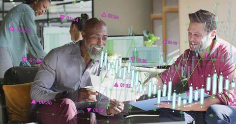 Multiracial team reviewing data-driven reports in modern office lounge with graph overlays