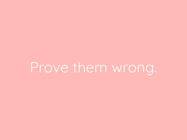 Empowering quote 'Prove them wrong' on a soft pink background suitable for social media posts, presentations, wallpapers, and other digital materials. Ideal for spreading positive energy and inspiring resilience in various audiences.