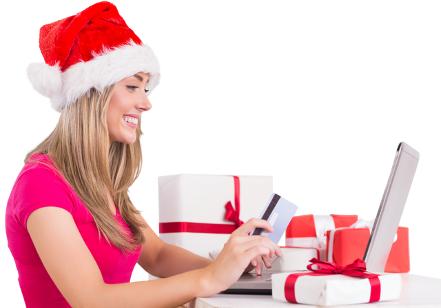 Festive Woman in Santa Hat Shopping Online with Laptop and Gifts - Download Free Stock Videos Pikwizard.com