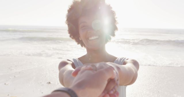 Happy Woman Holding Hand at Sunset Beach - Download Free Stock Images Pikwizard.com