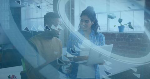 Colleagues Collaborating with Holographic Technology in Modern Office