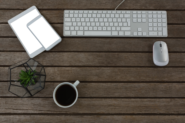 Modern Office Desk with Transparent Devices and Coffee - Download Free Stock Videos Pikwizard.com