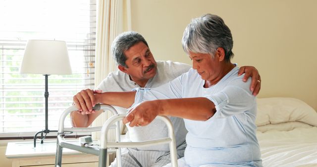 Elderly Couple in Bedroom Using Walker for Mobility - Download Free Stock Images Pikwizard.com