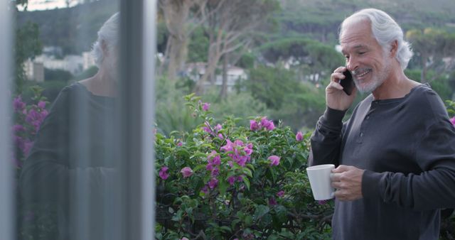 Senior Man Enjoying Morning Coffee While Talking on Smartphone - Download Free Stock Images Pikwizard.com