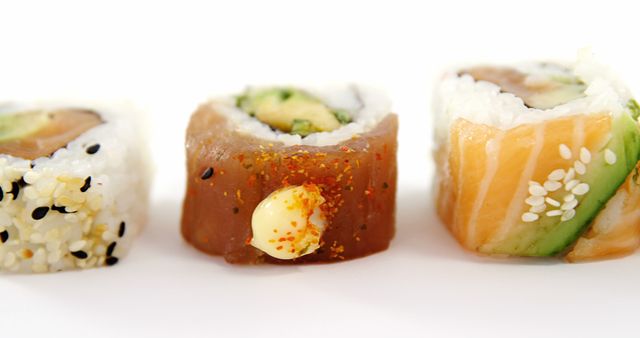 Assorted Sushi Rolls on White Background With Copy Space - Download Free Stock Images Pikwizard.com